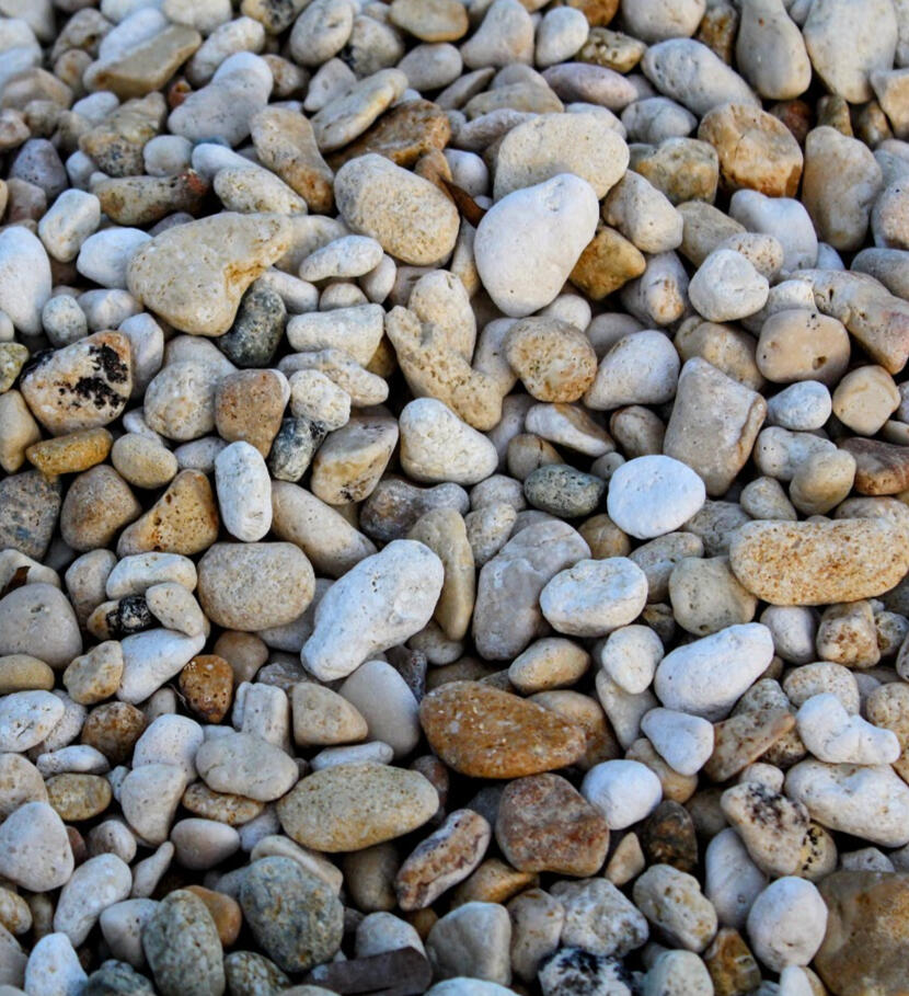 A photo of mixed pebbles on a beach taken by Rebecca. This photo represents Rebecca's creative expression and how she integrates it in her work with individuals, couples, families and children requiring psychotherapy.